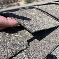 look for in hail damage roof